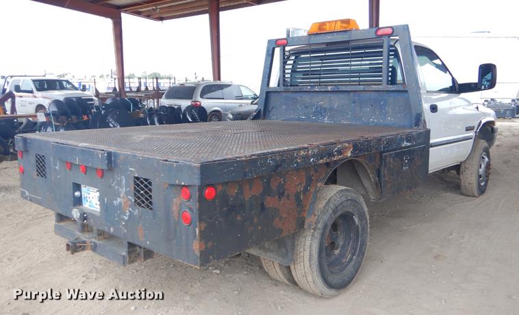 image for item EW9531 2002 Dodge Ram 3500 Laramie SLT flatbed pickup truck