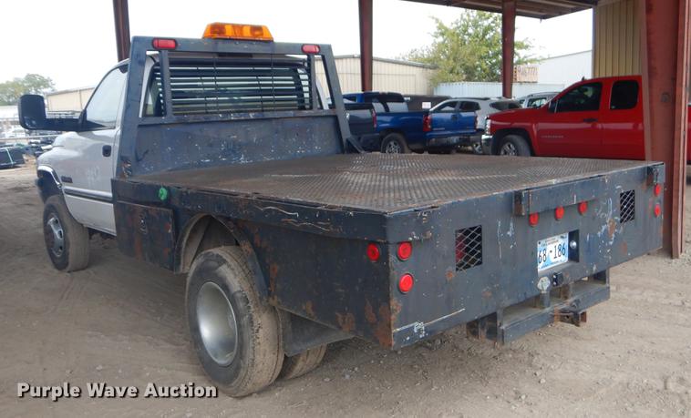 image for item EW9531 2002 Dodge Ram 3500 Laramie SLT flatbed pickup truck
