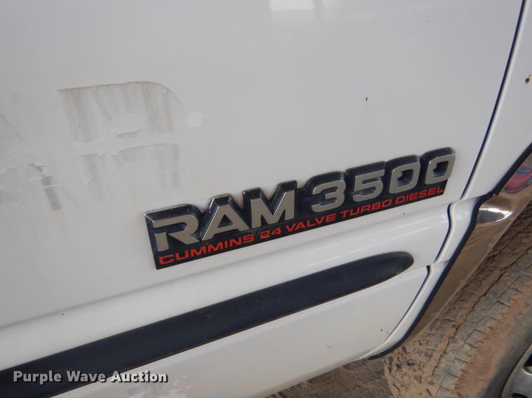 image for item EW9531 2002 Dodge Ram 3500 Laramie SLT flatbed pickup truck