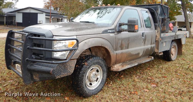 image for item EW9575 2015 Ford F350 Super Duty XL SuperCab bale bed pickup truck