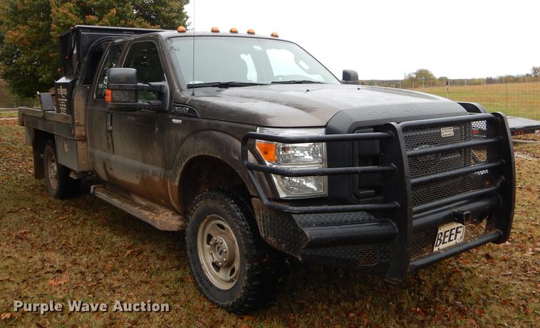 image for item EW9575 2015 Ford F350 Super Duty XL SuperCab bale bed pickup truck