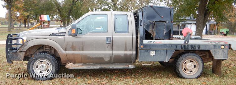 image for item EW9575 2015 Ford F350 Super Duty XL SuperCab bale bed pickup truck