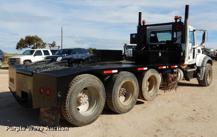 image for item DC5928 2009 Mack GU713 Granite winch truck