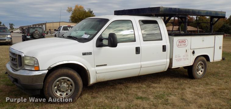 image for item DD3506 2002 Ford F350 Super Duty Crew Cab utility bed pickup truck