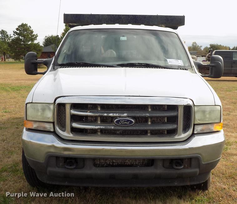 image for item DD3506 2002 Ford F350 Super Duty Crew Cab utility bed pickup truck