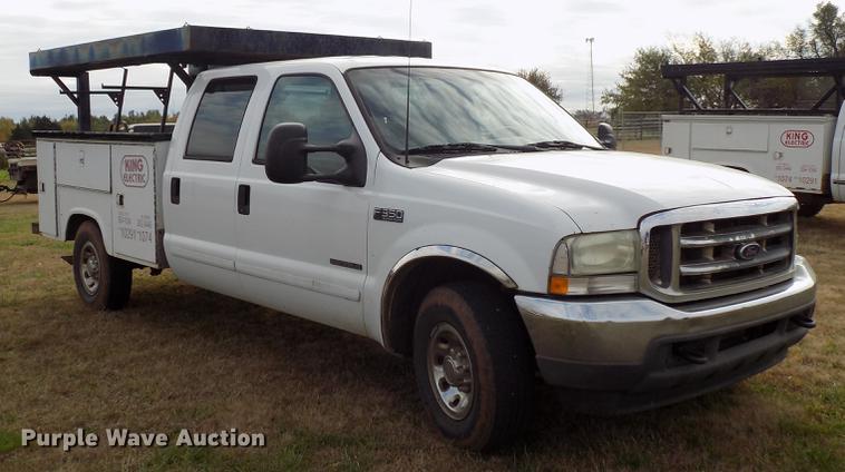 image for item DD3506 2002 Ford F350 Super Duty Crew Cab utility bed pickup truck