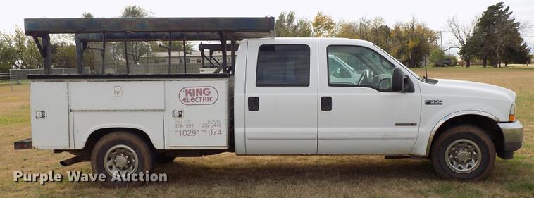 image for item DD3506 2002 Ford F350 Super Duty Crew Cab utility bed pickup truck