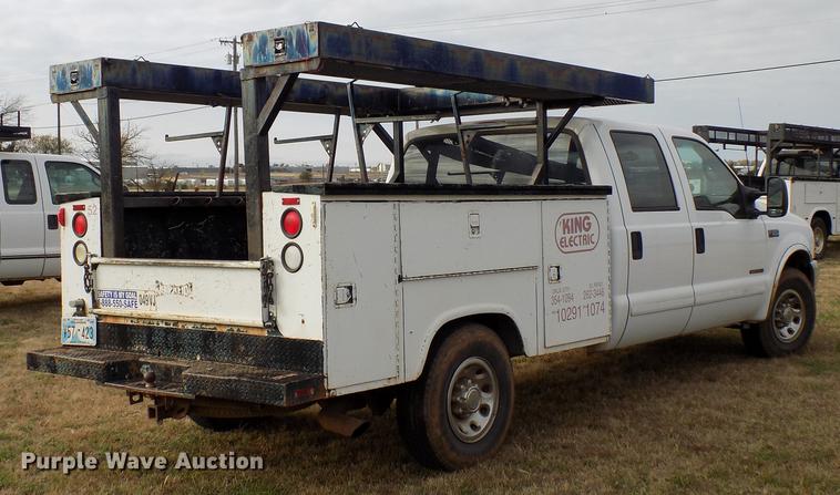 image for item DD3506 2002 Ford F350 Super Duty Crew Cab utility bed pickup truck