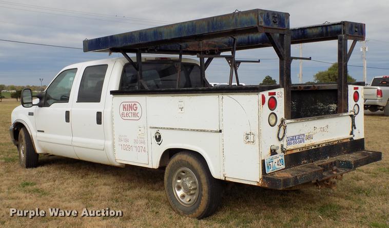 image for item DD3506 2002 Ford F350 Super Duty Crew Cab utility bed pickup truck