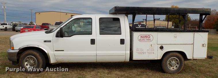 image for item DD3506 2002 Ford F350 Super Duty Crew Cab utility bed pickup truck