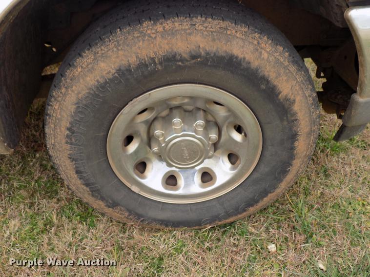 image for item DD3506 2002 Ford F350 Super Duty Crew Cab utility bed pickup truck