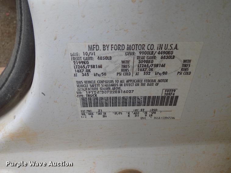 image for item DD3506 2002 Ford F350 Super Duty Crew Cab utility bed pickup truck