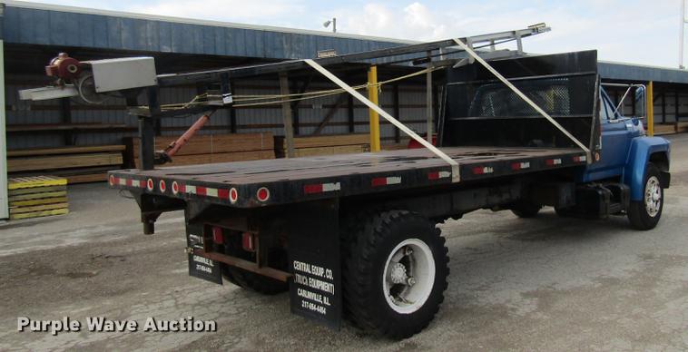 image for item DE5888 1995 Ford F700 flat dump bed truck