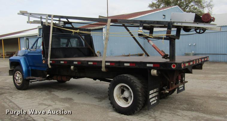 image for item DE5888 1995 Ford F700 flat dump bed truck