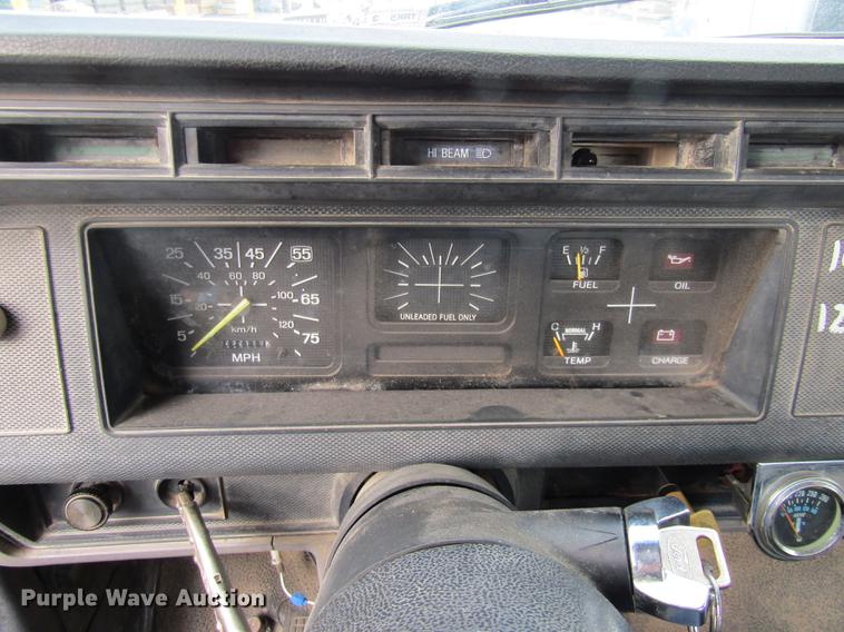 image for item DE5888 1995 Ford F700 flat dump bed truck