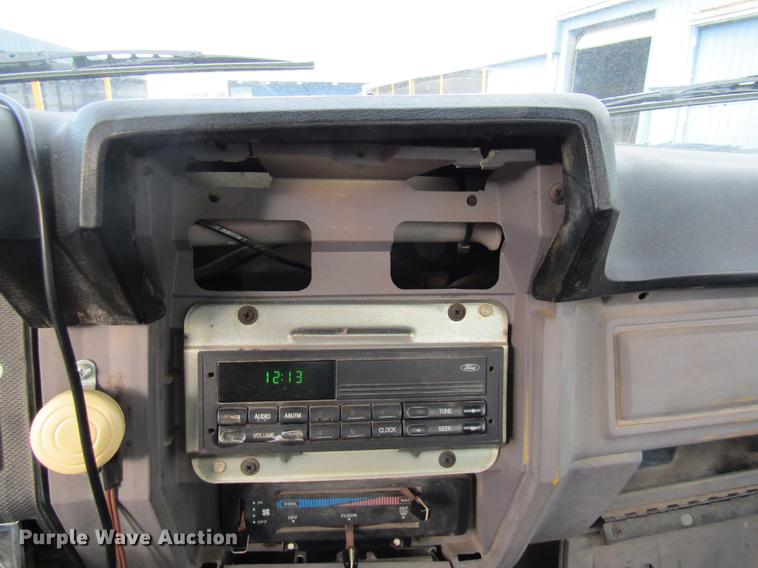 image for item DE5888 1995 Ford F700 flat dump bed truck