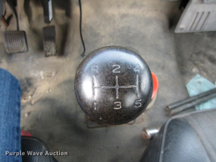 image for item DE5888 1995 Ford F700 flat dump bed truck