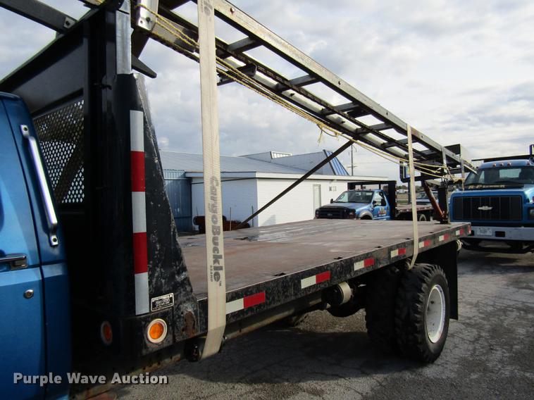image for item DE5888 1995 Ford F700 flat dump bed truck