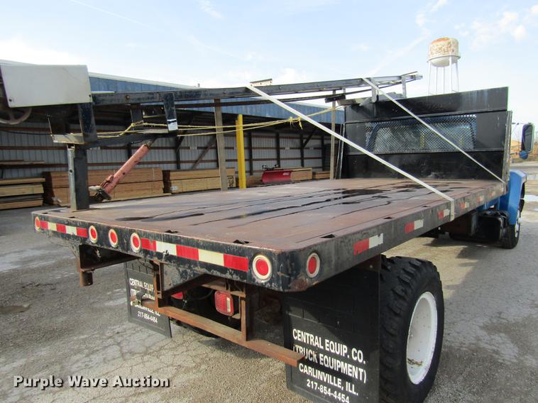 image for item DE5888 1995 Ford F700 flat dump bed truck