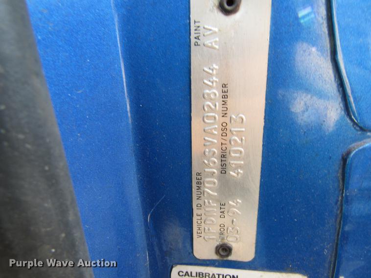 image for item DE5888 1995 Ford F700 flat dump bed truck