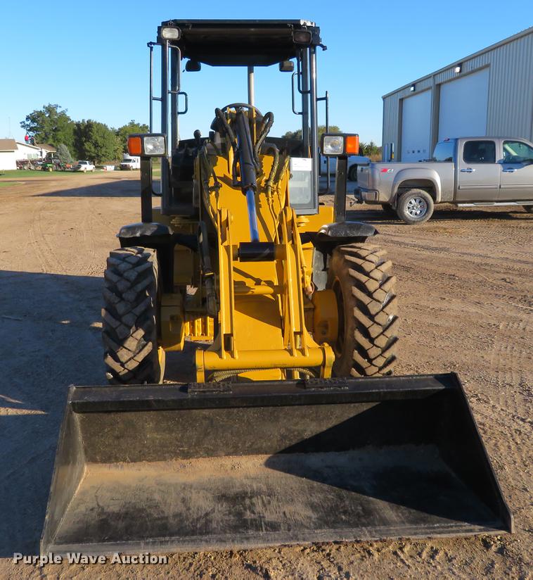 image for item DE6529 2002 Caterpillar 906 wheel loader