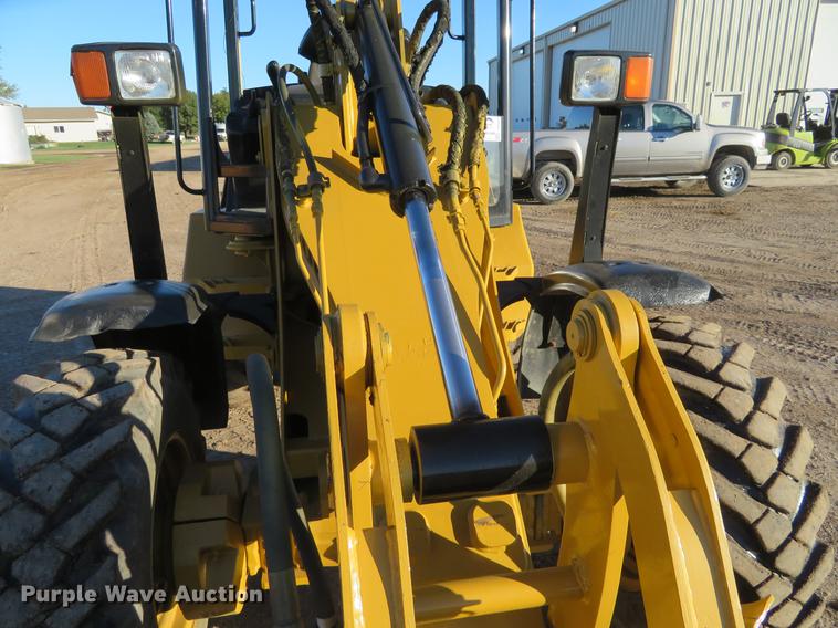 image for item DE6529 2002 Caterpillar 906 wheel loader
