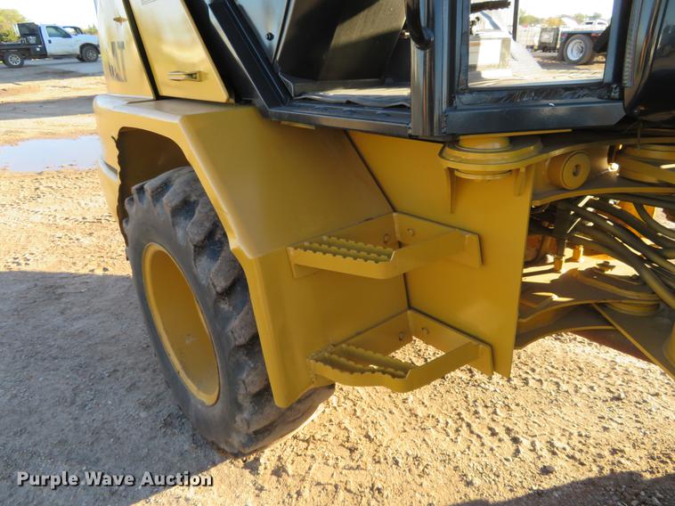 image for item DE6529 2002 Caterpillar 906 wheel loader