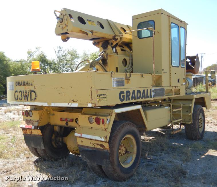 image for item DF2035 1994 Gradall G3WD rubber tire excavator