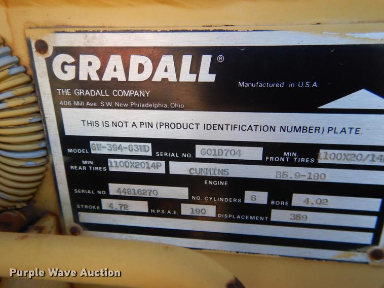 image for item DF2035 1994 Gradall G3WD rubber tire excavator