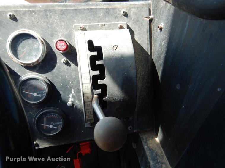 image for item DF2035 1994 Gradall G3WD rubber tire excavator