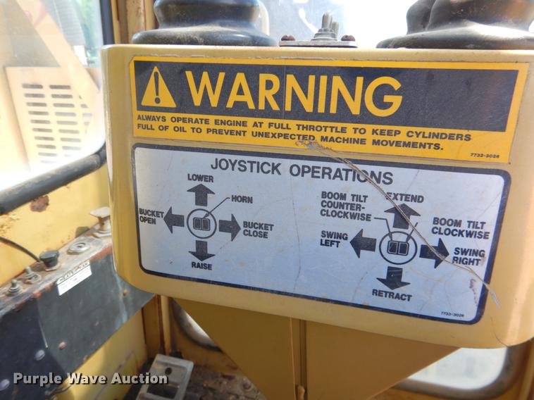 image for item DF2035 1994 Gradall G3WD rubber tire excavator