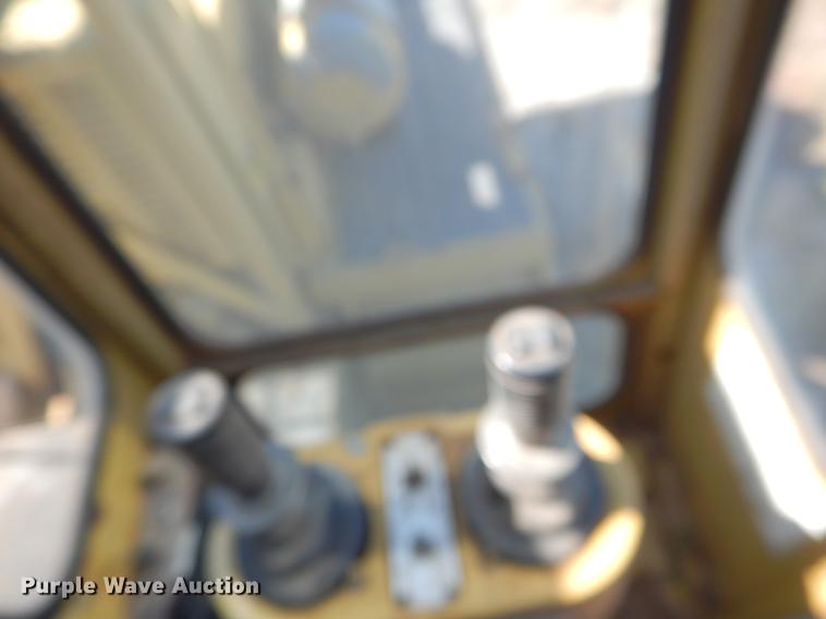 image for item DF2035 1994 Gradall G3WD rubber tire excavator