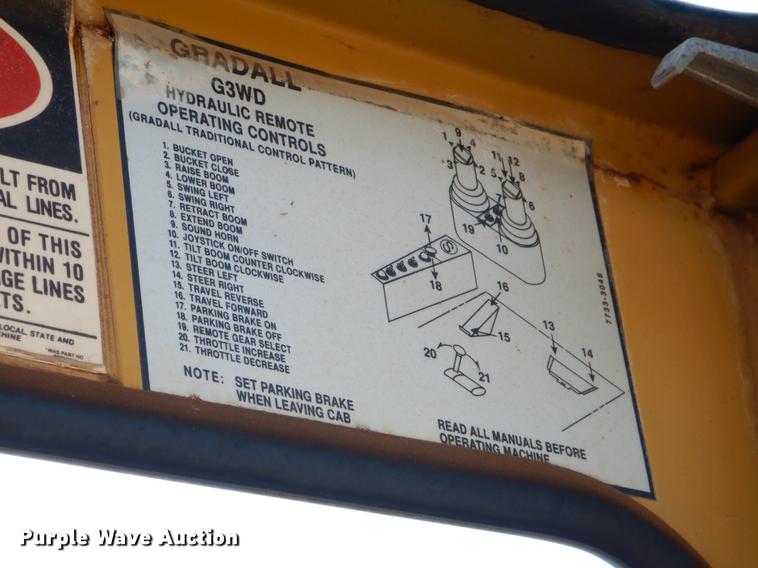 image for item DF2035 1994 Gradall G3WD rubber tire excavator