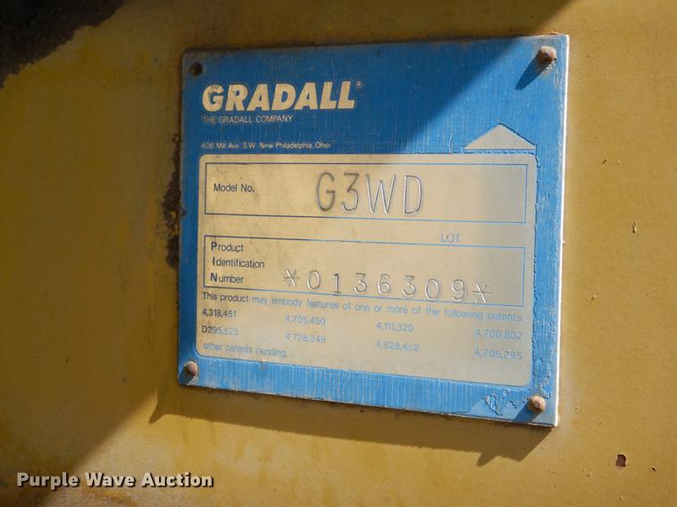 image for item DF2035 1994 Gradall G3WD rubber tire excavator