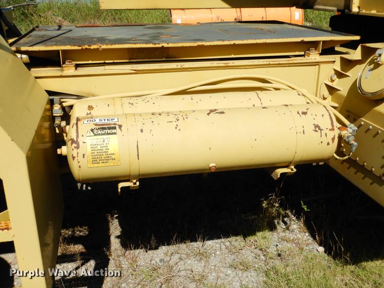 image for item DF2035 1994 Gradall G3WD rubber tire excavator