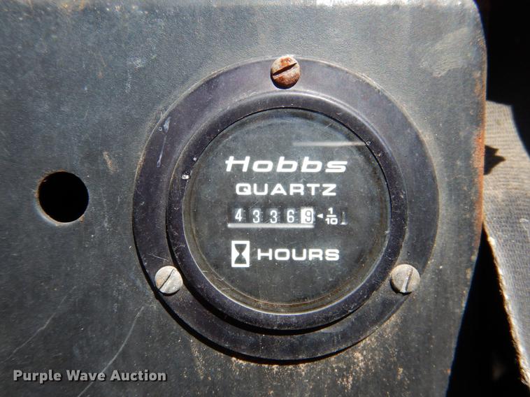 image for item DF2036 1987 Badger 444 Hydro-Scopic rubber tire excavator