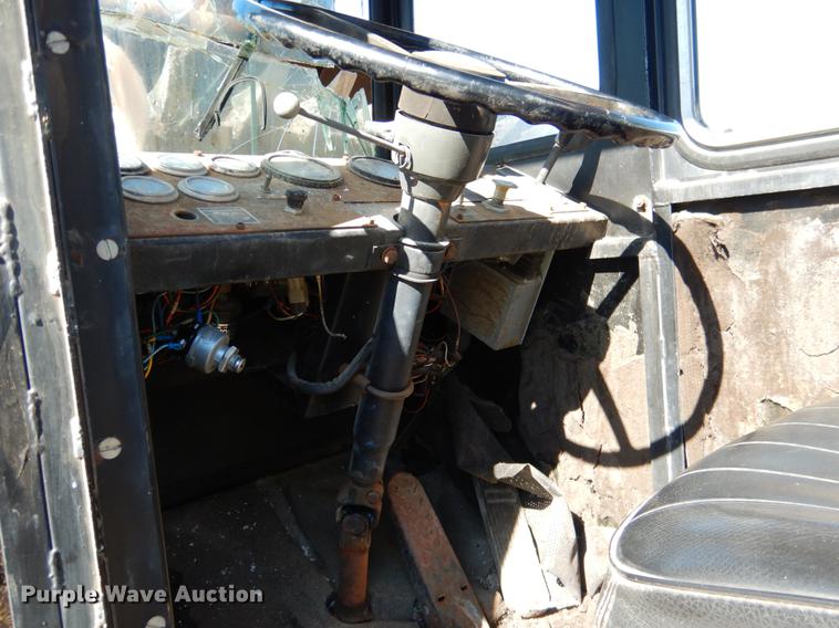 image for item DF2036 1987 Badger 444 Hydro-Scopic rubber tire excavator