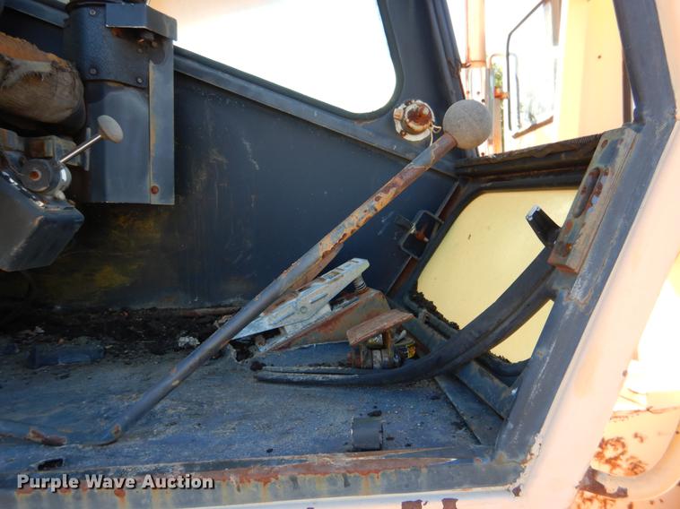 image for item DF2036 1987 Badger 444 Hydro-Scopic rubber tire excavator