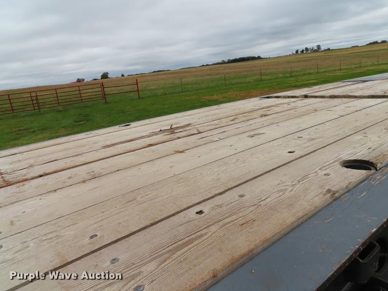 image for item DN9223 2014 Matrixx folding neck flatbed oilfield trailer