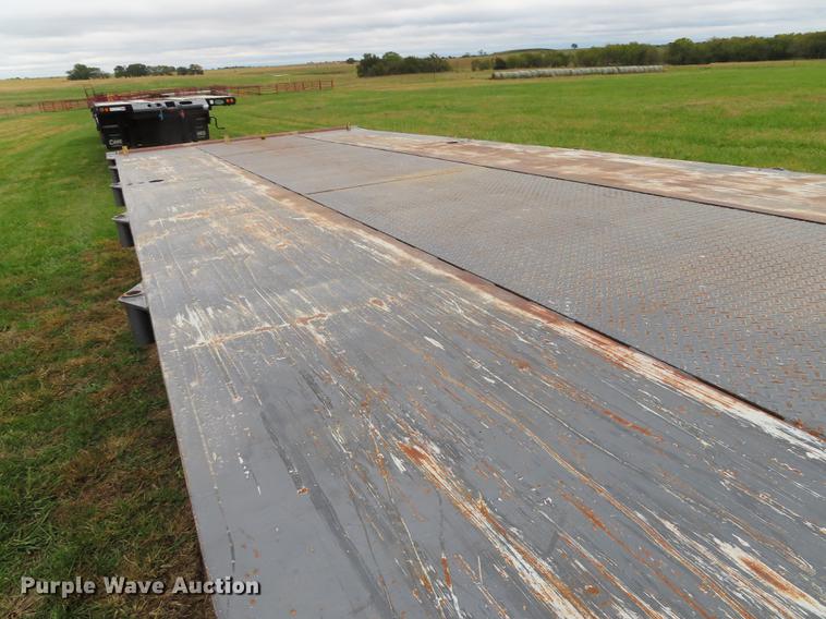 image for item DN9223 2014 Matrixx folding neck flatbed oilfield trailer