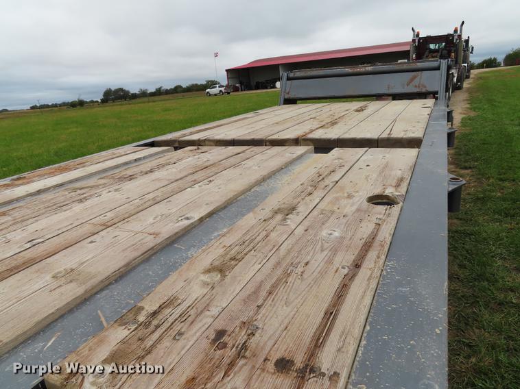 image for item DN9223 2014 Matrixx folding neck flatbed oilfield trailer