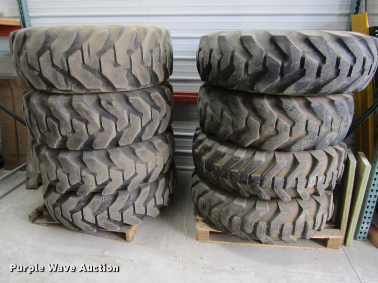 image for item EU9518 (8) 14-24 foam filled tires and wheels