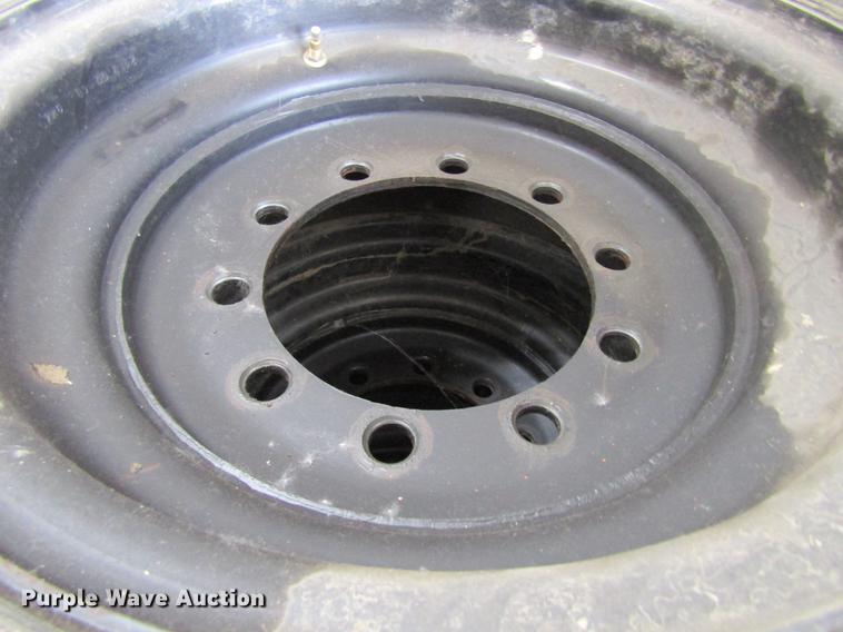 image for item EU9518 (8) 14-24 foam filled tires and wheels