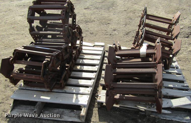 image for item EU9522 Grouser skid steer over tire tracks