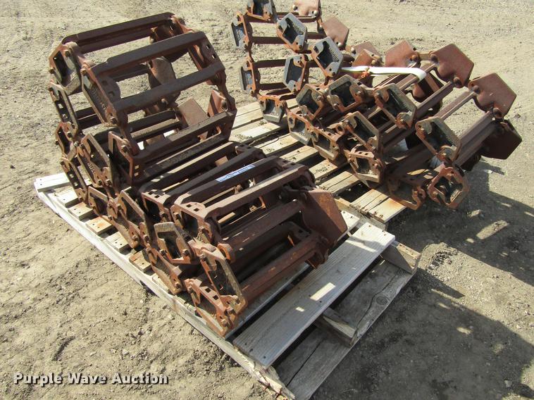 image for item EU9522 Grouser skid steer over tire tracks