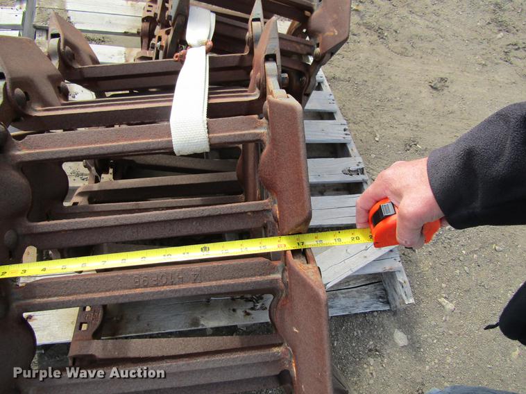 image for item EU9522 Grouser skid steer over tire tracks