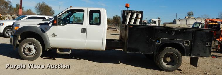 image for item K5796 2011 Ford F550 Super Duty SuperCab utility bed truck