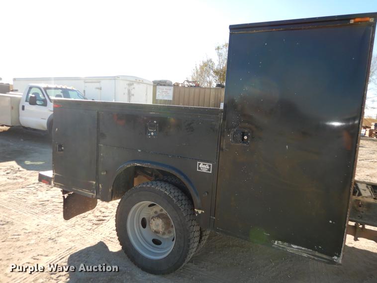 image for item K5796 2011 Ford F550 Super Duty SuperCab utility bed truck