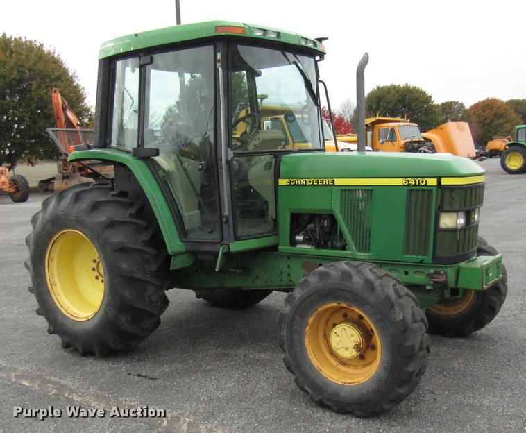 image for item DE5900 2001 John Deere 6410 MFWD tractor