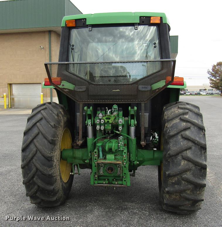 image for item DE5900 2001 John Deere 6410 MFWD tractor